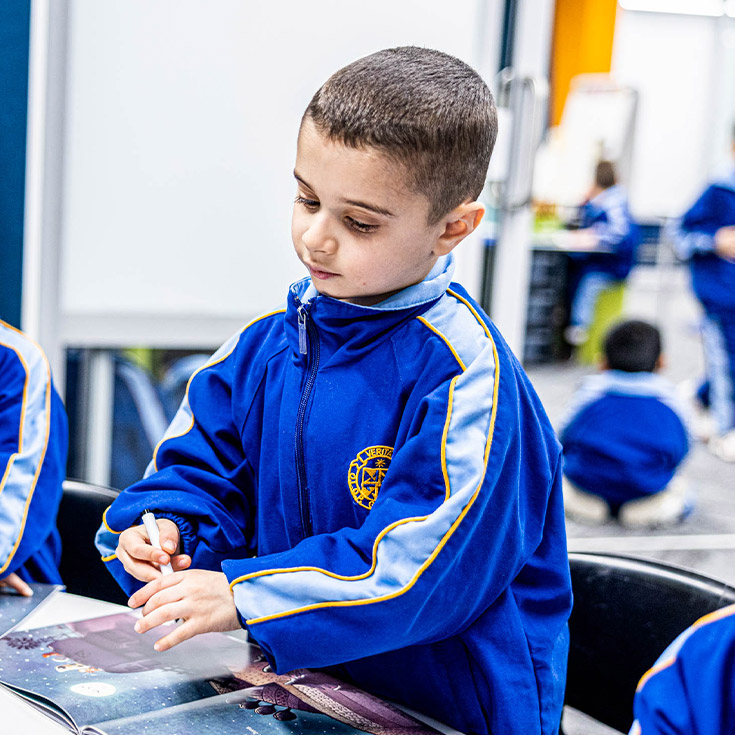 Student learning in the classroom at Our Lady Queen of Peace Primary School Greystanes