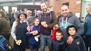 Happy Fathers and their kids enjoying their breakfast