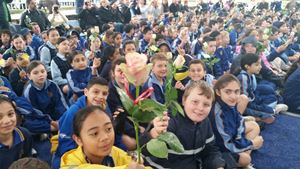 Students and their roses for dad