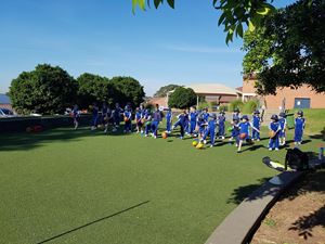 Kicking the ball and having fun AFL