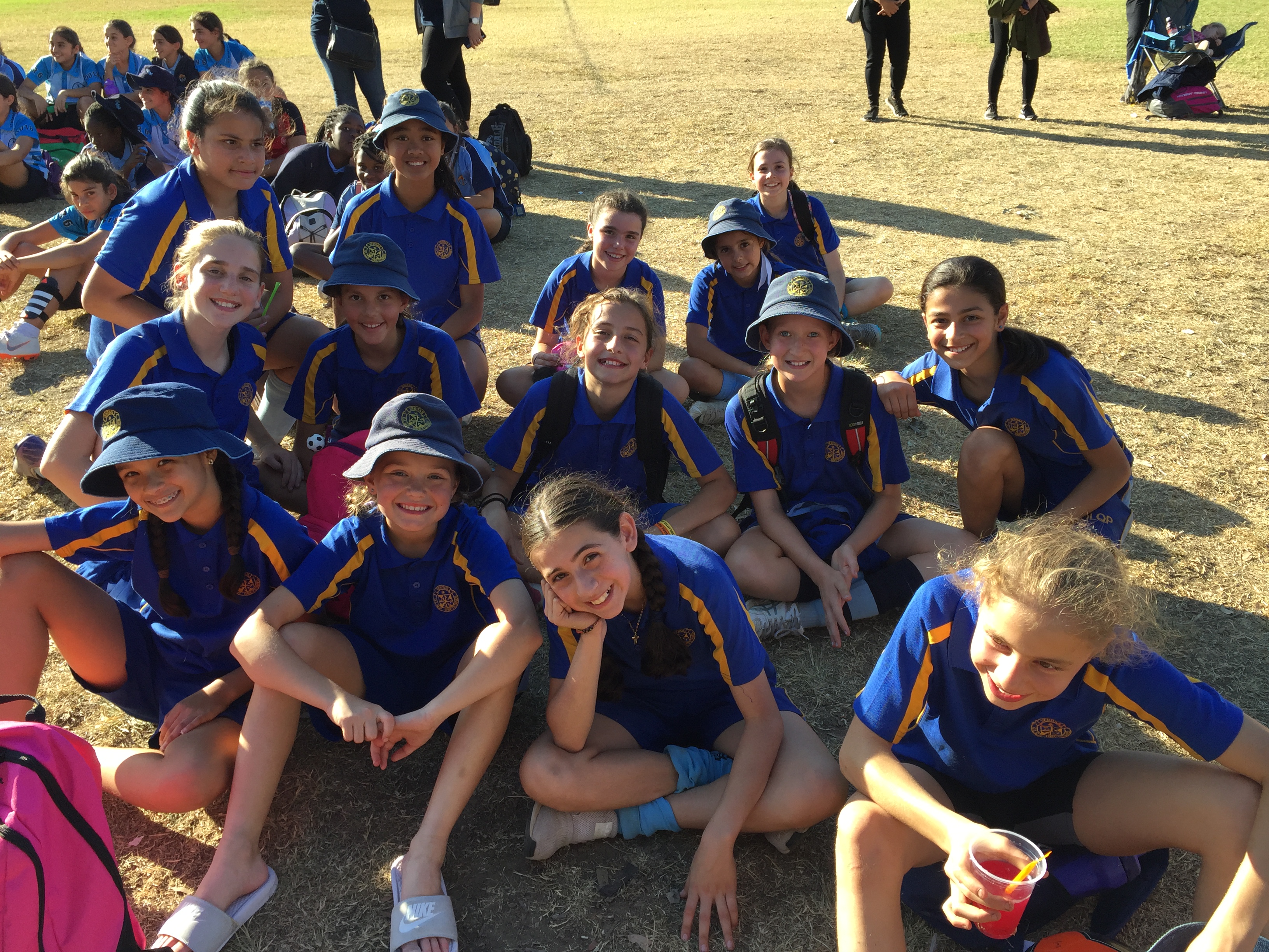 The girls hanging out at the soccer gala day