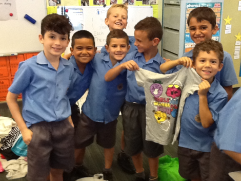 Students at OLQP are happy to donate t-shirts 