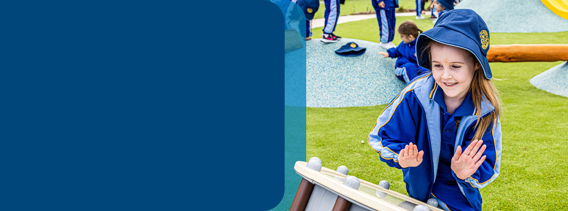 Student playing a drum in the playground at Our Lady Queen of Peace Primary School Greystanes