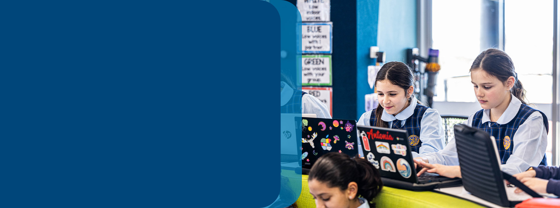 Students using their laptops in the classroom at Our Lady Queen of Peace Primary School Greystanes