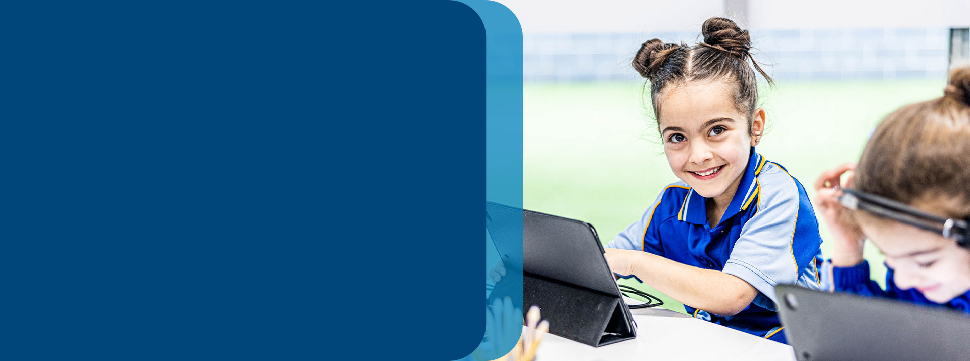 Student using her tablet in the classroom at Our Lady Queen of Peace Primary School Greystanes