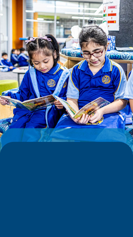Students reading in the library at Our Lady Queen of Peace Primary School Greystanes