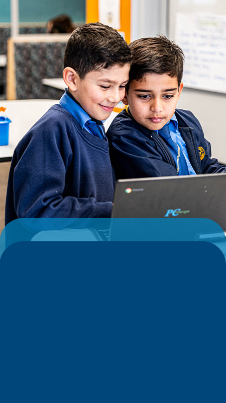 Students learning together in the classroom at Our Lady Queen of Peace Primary School Greystanes