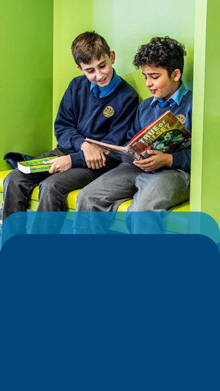 Students reading in the library at Our Lady Queen of Peace Primary School Greystanes