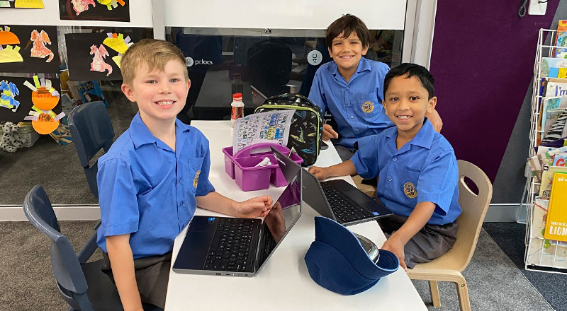 Students learning together in the classroom at Our Lady Queen of Peace Primary School Greystanes
