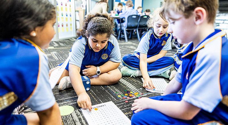 Students learning numeracy in the classroom at Our Lady Queen of Peace Primary School Greystanes