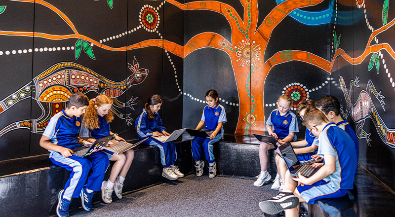 Students working together in the breakout hub at Our Lady Queen of Peace Primary School Greystanes