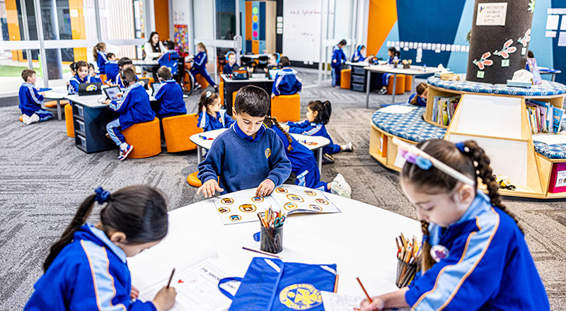 Students learning in the classroom at Our Lady Queen of Peace Primary School Greystanes