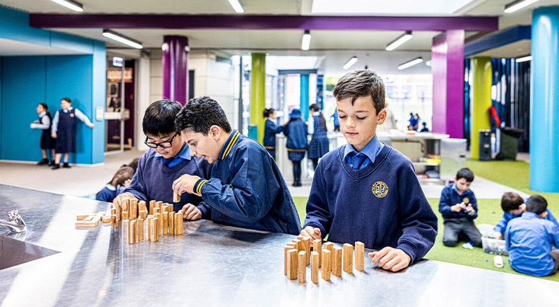 Students playing games in learning street at Our Lady Queen of Peace Primary School Greystanes