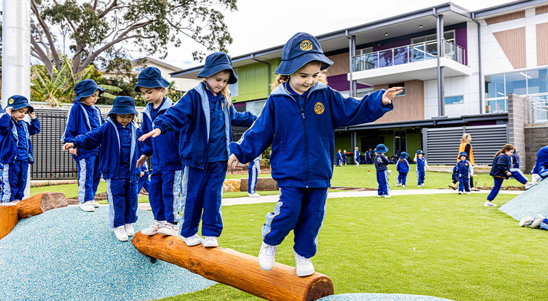 Students balancing in the playground at Our Lady Queen of Peace Primary School Greystanes