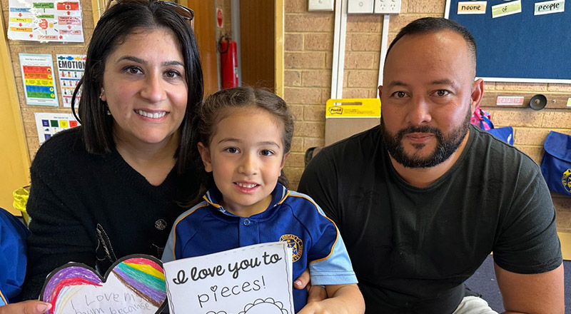 Student with her parents in the classroom at Our Lady Queen of Peace Primary School Greystanes