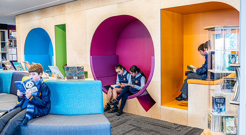 Students reading in the library at Our Lady Queen of Peace Primary School Greystanes