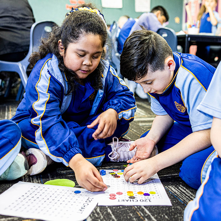 Students learning to count in the classroom at Our Lady Queen of Peace Primary School Greystanes