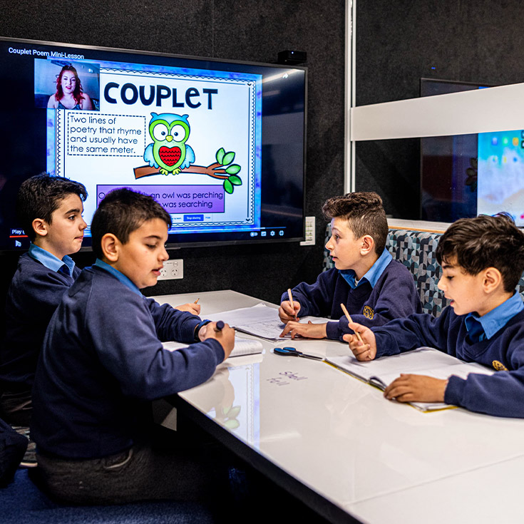 Students working together in the breakout hub at Our Lady Queen of Peace Primary School Greystanes