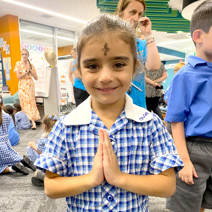 Student during Ash Wednesday liturgy at Our Lady Queen of Peace Primary School Greystanes