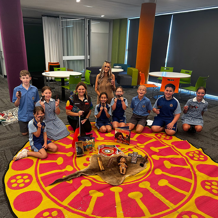 Students during a Yarn with Aunty Alicia from Jarara in the classroom at Our Lady Queen of Peace Primary School Greystanes